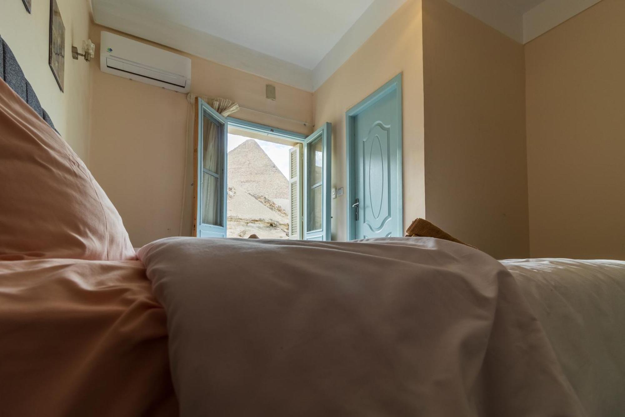 The Grand Pyramids View Hotel Kafret el-Gabal Zimmer foto