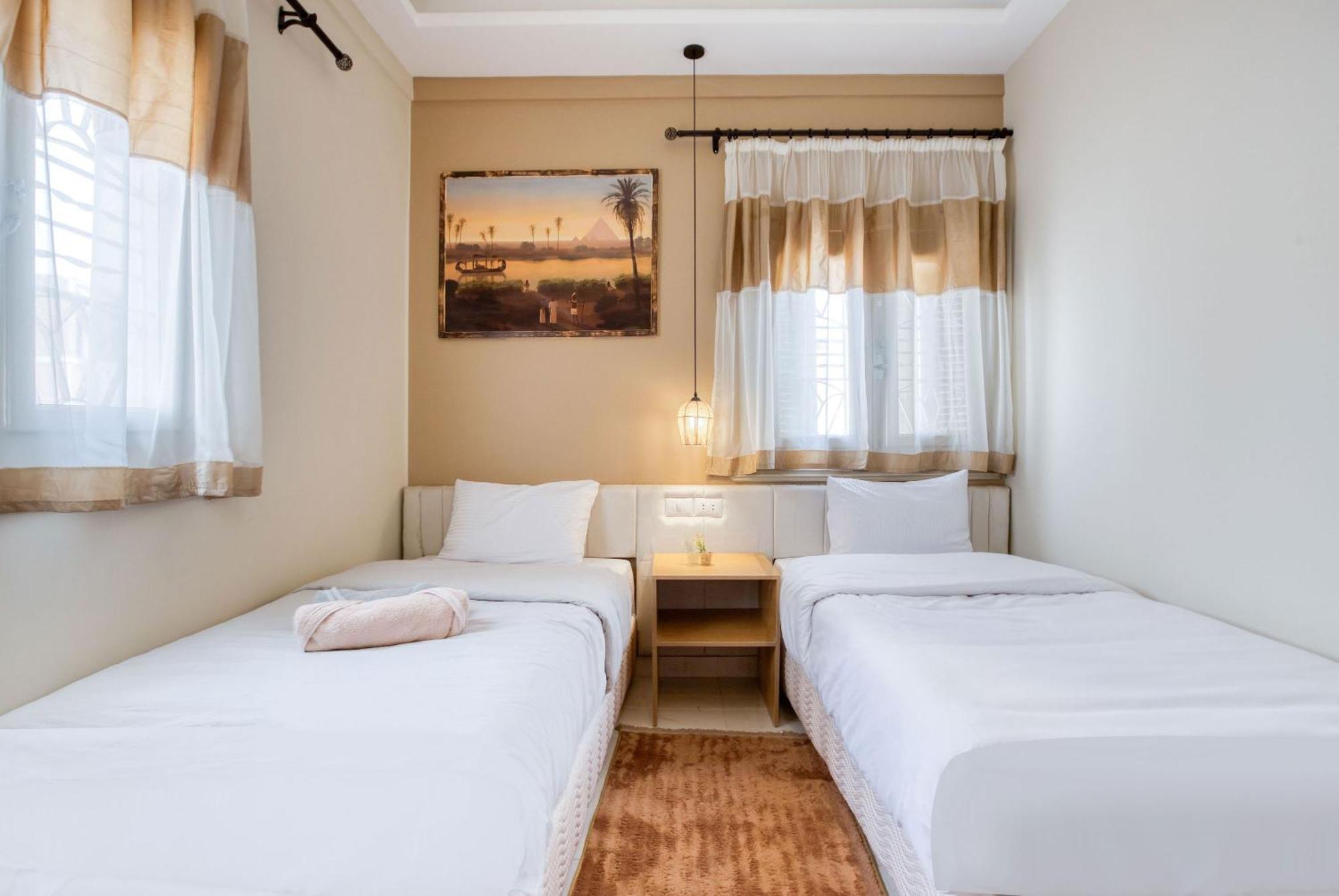 The Grand Pyramids View Hotel Kafret el-Gabal Zimmer foto